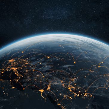 Glowing network connections across Earth at night.