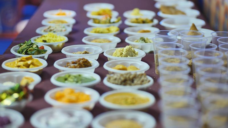 Variety of traditional Indian dishes and snacks prepared for community offering and sharing