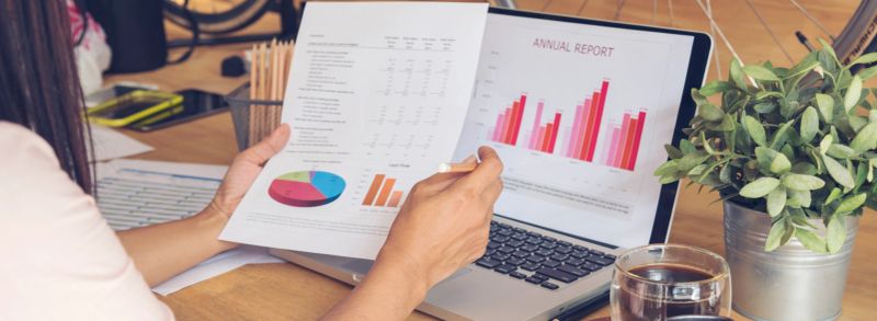 Banner Closeup businesswoman hands working use laptop finance business document reading report paperwork office desk. Banner Excel graph Spreadsheet Document showing Information Financial Startup