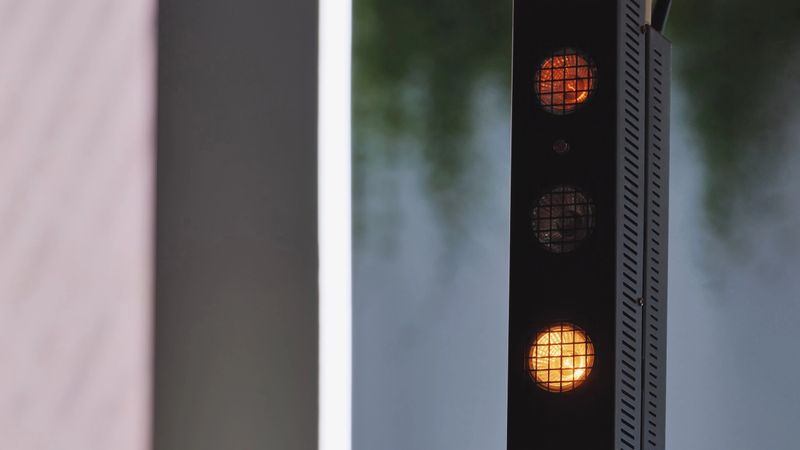 Stage lighting equipment featuring orange LED lamps, used for events and performances