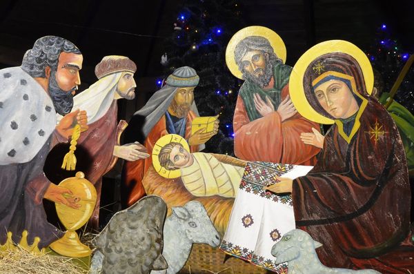 Nativity scene with baby Jesus and figures.