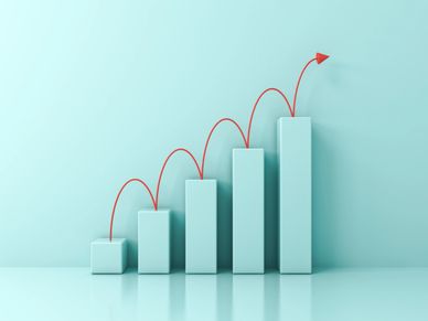 3D bar graph showing growth with red arrow indicating upward trend.