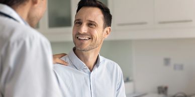 Man discussing health optimization with his provider