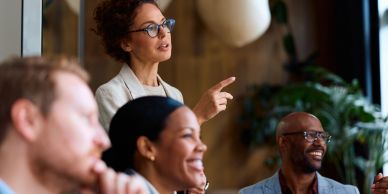 Businesswoman leading a meeting with colleagues.