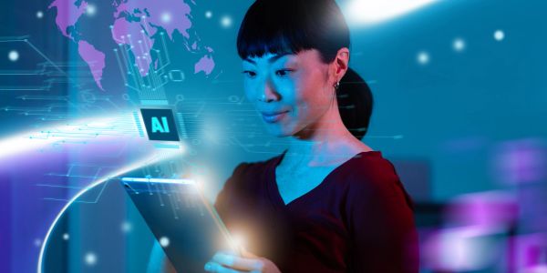 Woman using digital tablet with AI hologram.