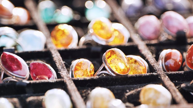 Colorful jewelry with natural stones for sale, showcasing cultural crafts and traditions