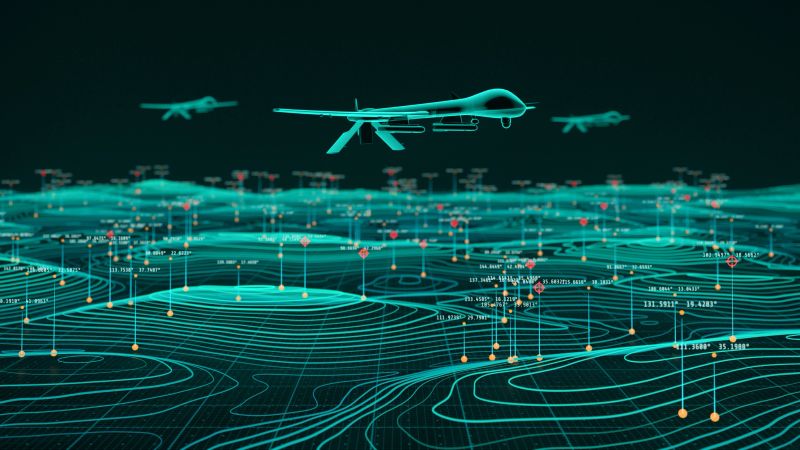 Military drones fly in formation above a glowing digital topographic grid with data points and target markers.