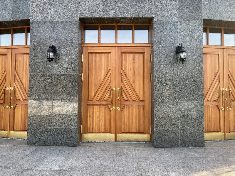Elegantly crafted custom wooden door with luxurious finish and intricate details.