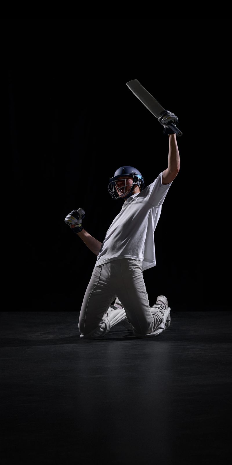 Cricket player shouting with bat raised after winning match. Concept of emotional sports victory visuals, championship marketing, team success campaigns, competitive achievement promotion.