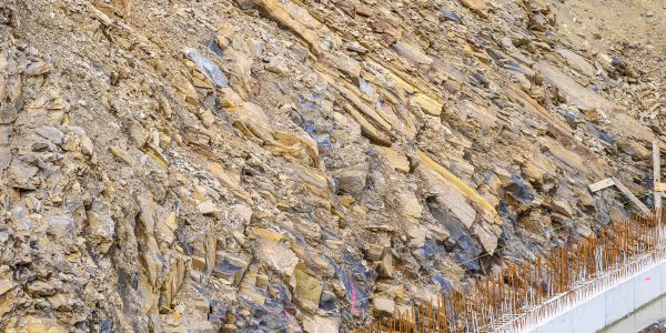 Close-up of rocky slope with construction base.