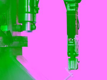 Industrial robotic arm performing precise manufacturing tasks.