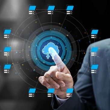 Businessman interacting with cloud computing interface.