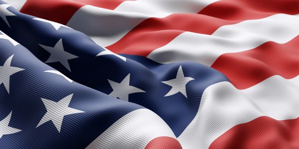 Close-up of the American flag with stars and stripes.