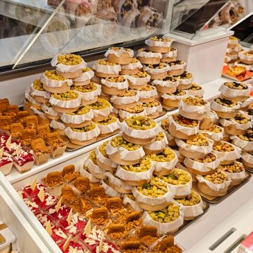 Display of assorted sweets and desserts in a shop.