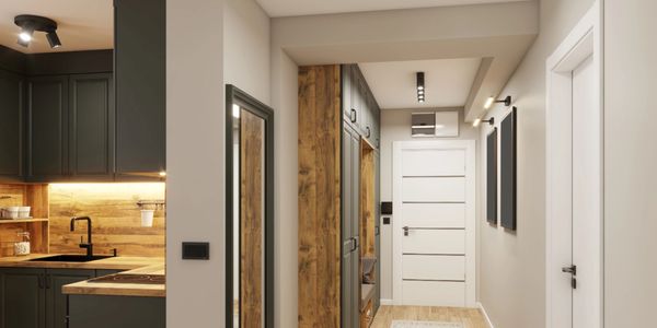 Modern hallway with wooden accents and adjacent kitchen area in neutral tones.