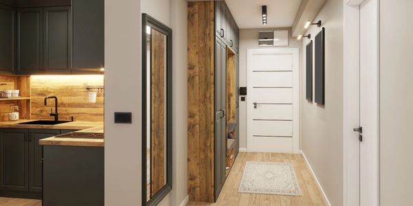 Modern hallway with wooden accents and a white door at the end.