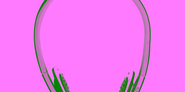 Casque audio vert sur fond rose.