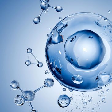 Illustration of molecules and a large water droplet.
