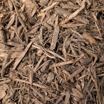 Close-up of brown wood chips and mulch.