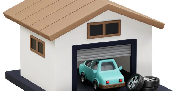A car inside a garage with tires outside.