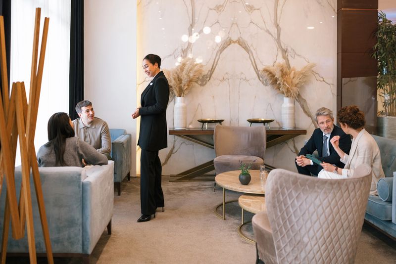 Concierge providing hospitality service to guests