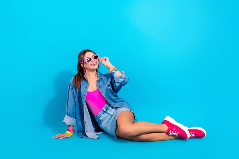 Stylish young woman in colorful outfit