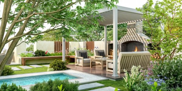Cozy backyard patio with fireplace and seating area.