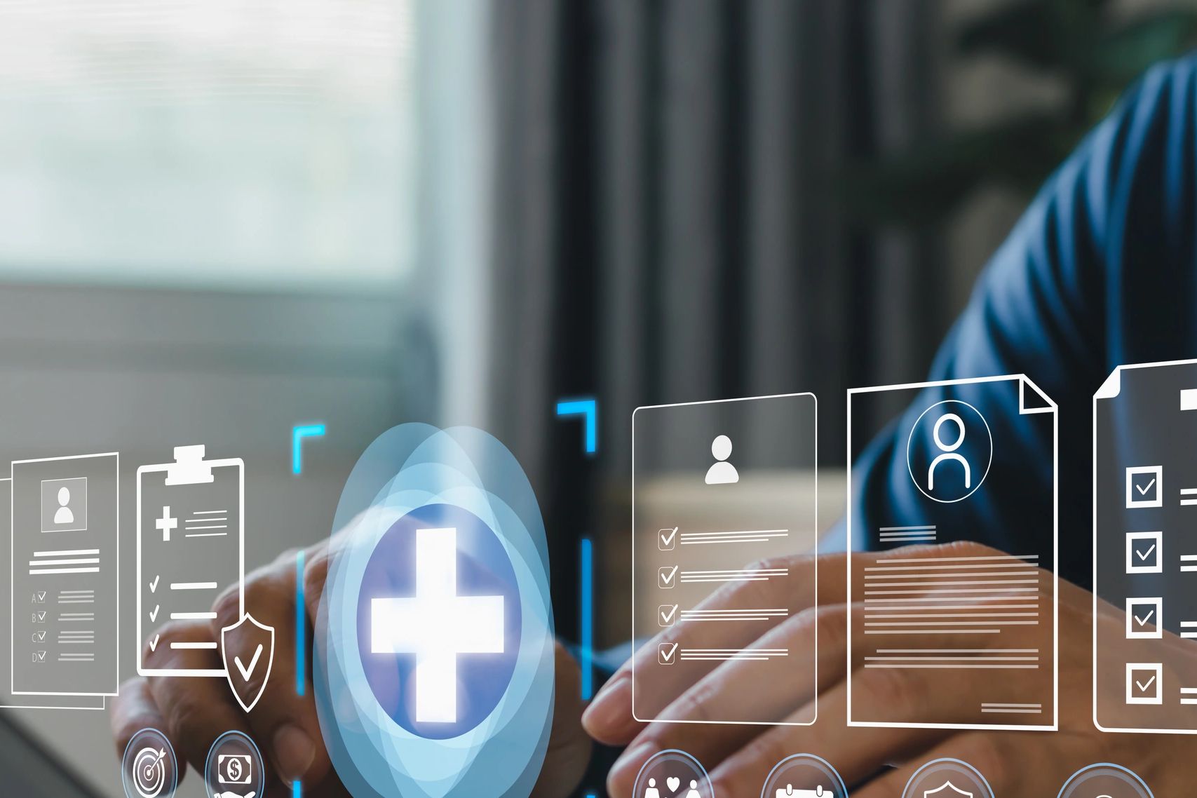 Hand interacting with virtual healthcare icons and documents.