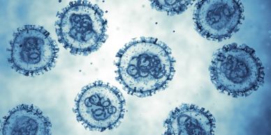 Close-up image of blue virus particles.