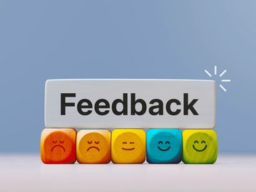 Blocks showing different feedback emotions with the word Feedback.