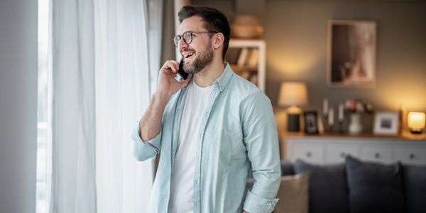 Man on phone in home
