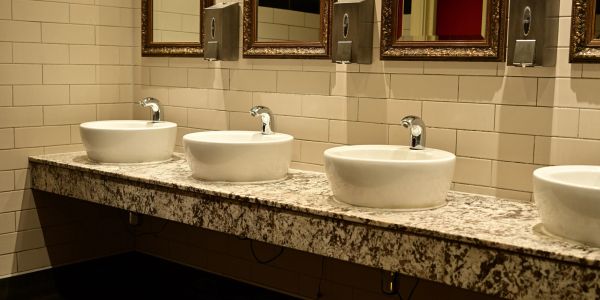 Modern bathroom sinks with mirrors above.