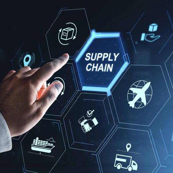 Hand interacting with digital supply chain icons.