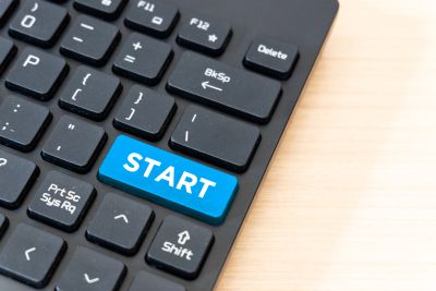 Keyboard with a blue START key.