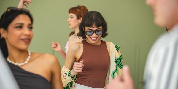 Group of friends dancing and enjoying themselves.