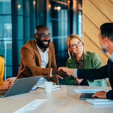 Businesspeople shaking hands.