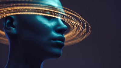 Futuristic digital face with glowing rings around the head.