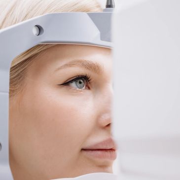 Woman undergoing eye examination.