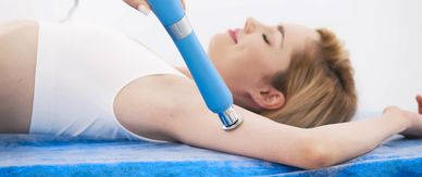Woman receiving treatment on her underarm.