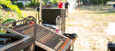 Outdoor audio mixing console setup.