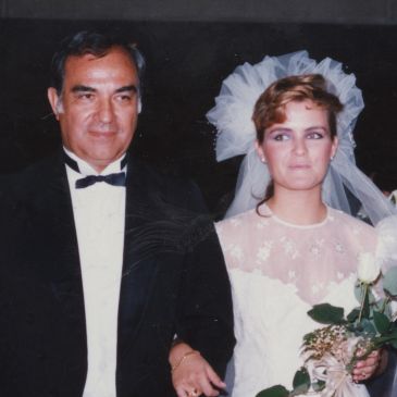 80's photo of a couple at their first  wedding ceremony