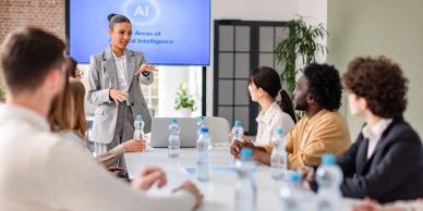 A businesswoman presents AI to a group in a meeting room.