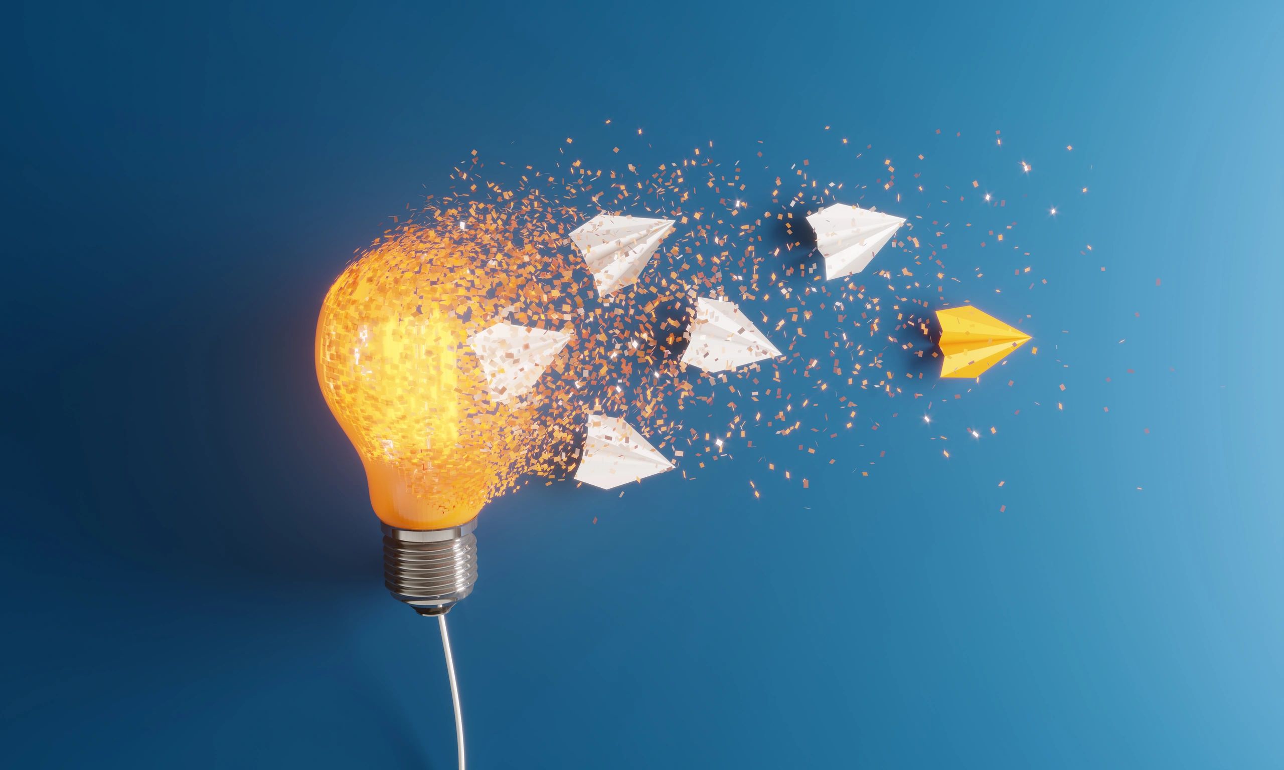 Disintegrating light bulb releasing paper planes.