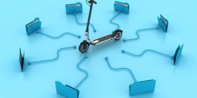 Electric scooter connected to multiple folders symbolizing data sharing.