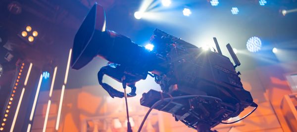 Filming on location at a professional setting.