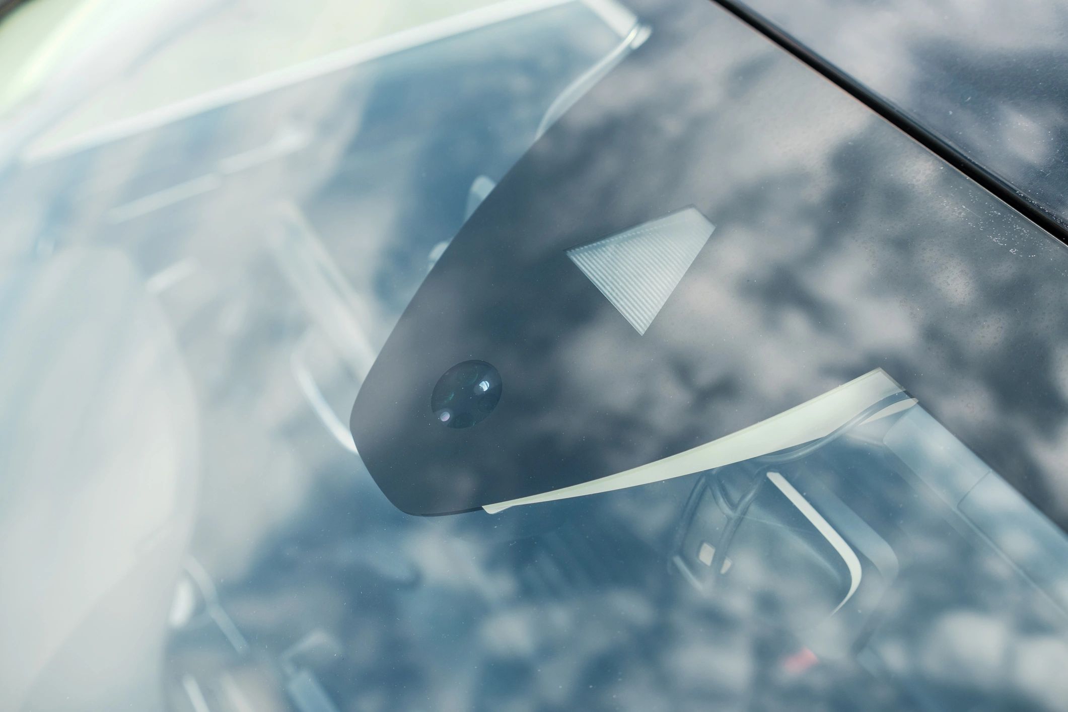 ADAS camera calibration equipment on windshield