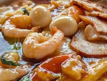 Hot Shrimp Tempura Ramen with fresh toppings.