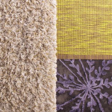 A close-up of three different textured rugs arranged side by side.