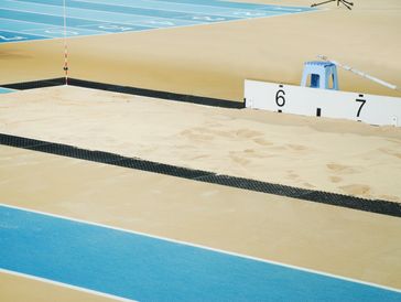 A long jump strip with measurement starting at 6 metres,