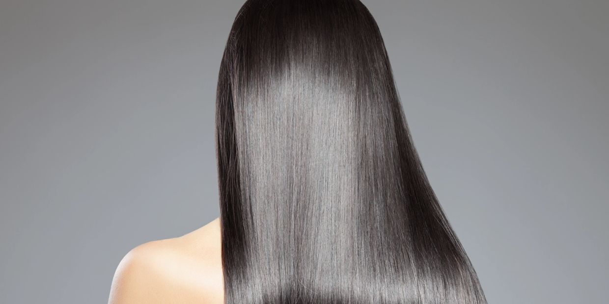 Sleek,healthy, jet-black hair from the back, showing extreme shine and Keratin Treatment smoothness 